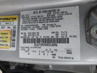 2017 Ford Fusion Energi SE with VIN 3FA6P0PU9HR354096, listed as a IAAI auction lot 42064703 with 69,601 mi miles. Bid and sale history available at carsss.com. Image 9.