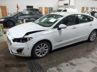 2019 Ford Fusion SE with VIN 3FA6P0LUXKR188040, listed as a IAAI auction lot 41079252 with 113,667 mi miles and . Bid and sale history available at carsss.com. Image 2.