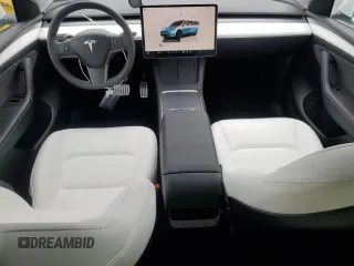 2023 Tesla Model Y Performance with VIN 7SAYGDEF1PF809654, listed as a Copart auction lot 43981915 with 16,401 mi miles and Salvage Title. Bid and sale history available at DreamBid. Image 8.