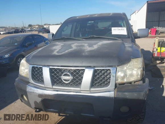 2005 Nissan Titan LE with VIN 1N6AA07B65N501054, listed as a IAAI auction lot 41728466 with 318,859 mi miles. Bid and sale history available at carsss.com. Image 12.