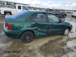 2001 Ford Focus LX with VIN 1FAFP33P91W363174, listed as a Copart auction lot 51299785 with 64,239 mi miles and Salvage Title. Bid and sale history available at carsss.com. Image 3.