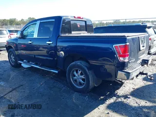 2011 Nissan Titan SL with VIN 1N6AA0EC0BN323844, listed as a IAAI auction lot 41768462 with 106,732 mi miles. Bid and sale history available at carsss.com. Image 3.