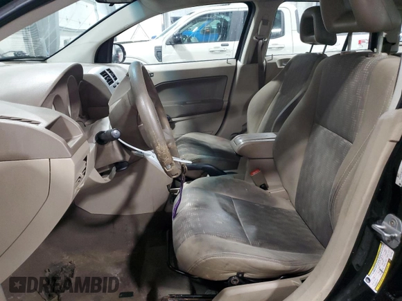 2008 Dodge Caliber SE z VIN 1B3HB28B58D717630, wystawiony jako Copart lot #46232175 z przebiegiem 242 361 mil mil oraz Nie do naprawy • Non repairable. Historia ofert i sprzedaży dostępna na DreamBid. Obrazek 7.