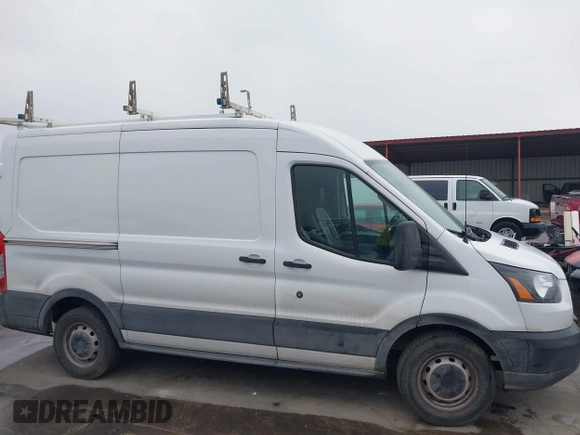 2019 Ford Transit with VIN 1FTYE1CM0KKB38525, listed as a IAAI auction lot 41940711 with 224,576 mi miles and . Bid and sale history available at DreamBid. Image 13.