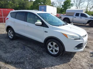 2014 Ford Escape SE with VIN 1FMCU0GXXEUC64892, listed as a IAAI auction lot 42101842 with 128,932 mi miles and . Bid and sale history available at DreamBid. Image 1.