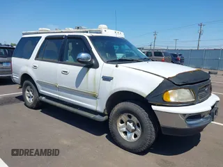 1997 Ford Expedition XLT z VIN 1FMFU18L3VLA65297, wystawiony jako IAAI lot #42418325 z przebiegiem 266 297 mil mil oraz . Historia ofert i sprzedaży dostępna na DreamBid. Obrazek 1.