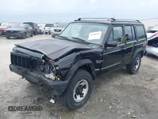 1994 Jeep Cherokee Sport with VIN 1J4FJ68S1RL160023, listed as a IAAI auction lot 41968610 with 255,978 mi miles. Bid and sale history available at carsss.com. Image 20.