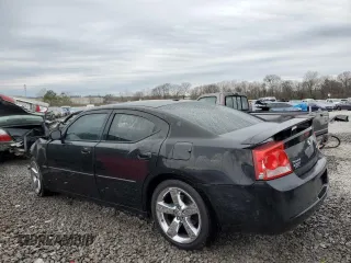 2010 Dodge Charger R/T with VIN 2B3CA5CT3AH172325, listed as a Copart auction lot 50302885 with 257,870 mi miles and Salvage Title. Bid and sale history available at carsss.com. Image 2.