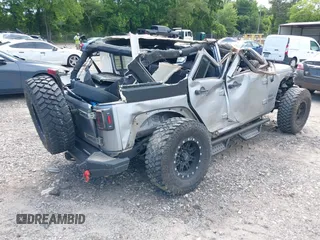 2017 Jeep Wrangler Unlimited Sport with VIN 1C4HJWDG6HL592265, listed as a IAAI auction lot 42335663 with 89,314 mi miles and . Bid and sale history available at DreamBid. Image 4.