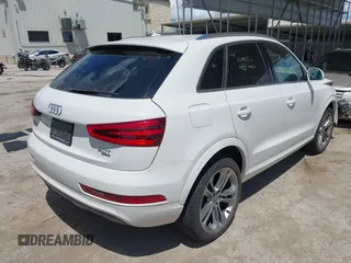 2015 Audi Q3 Prestige with VIN WA1GFCFS1FR007092, listed as a IAAI auction lot 42588730 with 85,290 mi miles and . Bid and sale history available at DreamBid. Image 4.