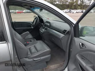 2005 Honda Odyssey EX-L with VIN 5FNRL38625B041067, listed as a IAAI auction lot 40519464 with 117,606 mi miles and . Bid and sale history available at carsss.com. Image 5.