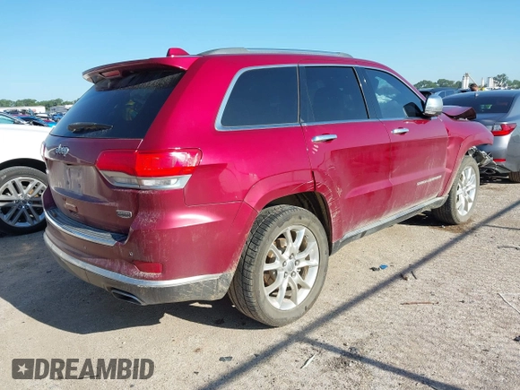 2015 Jeep Grand Cherokee Summit with VIN 1C4RJEJG9FC100568, listed as a IAAI auction lot 42512705 with 128,413 mi miles and . Bid and sale history available at DreamBid. Image 4.