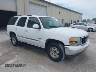 2004 GMC Yukon SLT with VIN 1GKEC13Z84R318127, listed as a IAAI auction lot 42053372 with 254,467 mi miles. Bid and sale history available at carsss.com. Image 1.