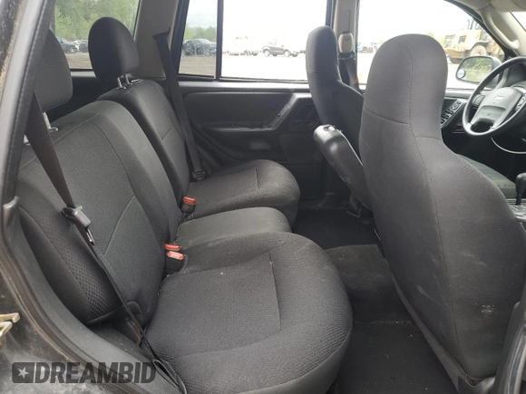 2003 Jeep Grand Cherokee Laredo z VIN 1J4GW48S53C568929, wystawiony jako Copart lot #57604245 z przebiegiem 216 103 mil mil oraz Czysty tytuł • Clean title. Historia ofert i sprzedaży dostępna na DreamBid. Obrazek 11.
