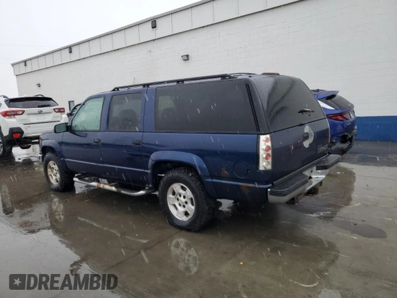 1996 Chevrolet Suburban z VIN 3GNFK16RXTG125871, wystawiony jako Copart lot #86401384 z przebiegiem 220 767 mil mil oraz Czysty tytuł • Clean title. Historia ofert i sprzedaży dostępna na DreamBid. Obrazek 2.