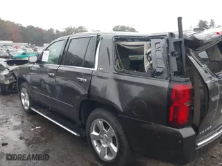 2015 Chevrolet Tahoe LTZ with VIN 1GNSCCKC7FR576236, listed as a IAAI auction lot 40794643 with 170,040 mi miles. Bid and sale history available at carsss.com. Image 14.
