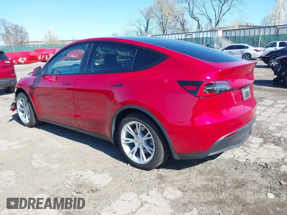 2021 Tesla Model Y Standard Range with VIN 5YJYGDED1MF111410, listed as a IAAI auction lot 41942323 with 24,836 mi miles. Bid and sale history available at carsss.com. Image 3.
