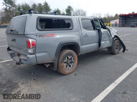 2021 Toyota Tacoma 4WD SR with VIN 3TMCZ5AN6MM392673, listed as a IAAI auction lot 41927892 with 53,470 mi miles. Bid and sale history available at carsss.com. Image 4.