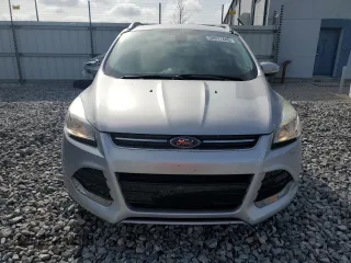 2015 Ford Escape Titanium z VIN 1FMCU0J97FUA14845, wystawiony jako Copart lot #58911445 z przebiegiem 110 437 mil mil oraz Szkoda całkowita • Salvage title. Historia ofert i sprzedaży dostępna na DreamBid. Obrazek 5.