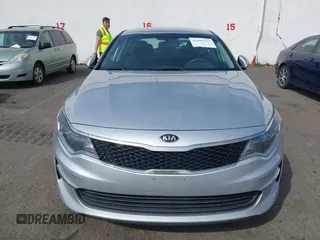 2017 Kia Optima LX with VIN 5XXGT4L39HG148760, listed as a IAAI auction lot 41889329 with 140,834 mi miles and . Bid and sale history available at DreamBid. Image 6.
