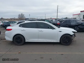 2017 Kia Optima LX with VIN 5XXGT4L32HG171992, listed as a IAAI auction lot 41477494 with 119,415 mi miles. Bid and sale history available at carsss.com. Image 12.