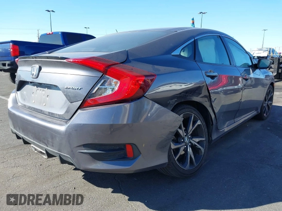 2021 Honda Civic Sedan Sport with VIN 19XFC2F88ME201751, listed as a IAAI auction lot 41643759 with 111,796 mi miles. Bid and sale history available at carsss.com. Image 4.