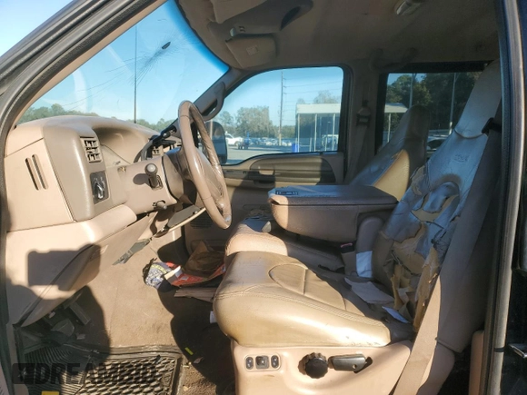 1999 Ford Super Duty F-250 XL with VIN 1FTNW21S4XEE54748, listed as a Copart auction lot 41395325 with 298,200 mi miles and Salvage Title. Bid and sale history available at carsss.com. Image 7.
