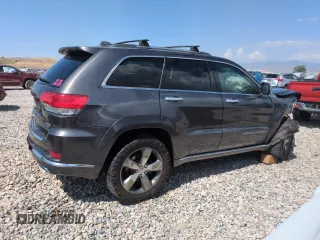 2014 Jeep Grand Cherokee Summit with VIN 1C4RJFJM8EC395169, listed as a Copart auction lot 60637265 with 116,575 mi miles and Salvage title. Bid and sale history available at DreamBid. Image 3.