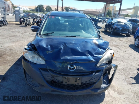 2014 Mazda 5 Sport with VIN JM1CW2BLXE0175975, listed as a IAAI auction lot 40278614 with 102,430 mi miles and . Bid and sale history available at DreamBid. Image 12.