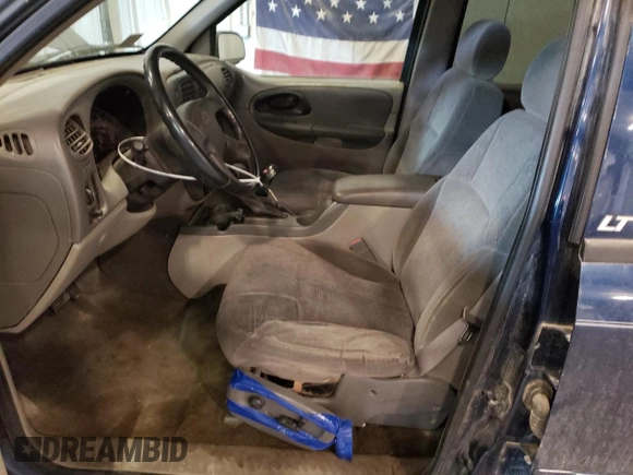 2003 Chevrolet TrailBlazer EXT LT with VIN 1GNET16S336244634, listed as a Copart auction lot 53784055 with 235,264 mi miles and Salvage Title. Bid and sale history available at DreamBid. Image 7.