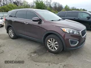 2016 Kia Sorento LX z VIN 5XYPG4A39GG061412, wystawiony jako Copart lot #57947885 z przebiegiem 134 381 mil mil oraz Szkoda całkowita • Salvage title. Historia ofert i sprzedaży dostępna na DreamBid. Obrazek 4.
