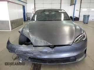 2022 Tesla Model S с VIN 5YJSA1E5XNF488415, выставлен на аукционе Copart как лот 57347565 с пробегом 18 662 миль миль и Списание • Salvage title. История ставок и продаж доступна на DreamBid. Изображение 5.