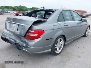 2014 Mercedes-Benz C 250 Sport with VIN WDDGF4HB6EG160494, listed as a IAAI auction lot 42310423 with 145,160 mi miles and . Bid and sale history available at DreamBid. Image 4.