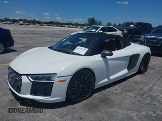 2017 Audi R8 z VIN WUAVACFX0H7903232, wystawiony jako IAAI lot #42247728 z przebiegiem 74 755 mil mil oraz . Historia ofert i sprzedaży dostępna na DreamBid. Obrazek 2.