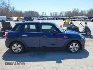 2015 MINI Hardtop 4 Door with VIN WMWXS5C58FT829805, listed as a IAAI auction lot 42023026 with 141,330 mi miles and . Bid and sale history available at DreamBid. Image 13.