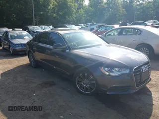 2014 Audi A6 Premium with VIN WAUFFAFC3EN059809, listed as a IAAI auction lot 42553835 with 168,457 mi miles and . Bid and sale history available at DreamBid. Image 1.