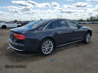 2012 Audi A8 z VIN WAURVAFD2CN021722, wystawiony jako Copart lot #58353745 z przebiegiem 117 302 mil mil oraz Szkoda całkowita • Salvage title. Historia ofert i sprzedaży dostępna na DreamBid. Obrazek 3.