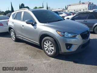 2013 Mazda CX-5 Touring with VIN JM3KE2CE3D0123138, listed as a IAAI auction lot 41818678 with 173,909 mi miles. Bid and sale history available at carsss.com. Image 1.