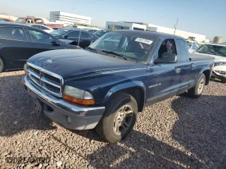 2002 Dodge Dakota SLT with VIN 1B7GL42X82S538802, listed as a Copart auction lot 58027844 with 121,254 mi miles and Salvage Title. Bid and sale history available at carsss.com. Image 1.