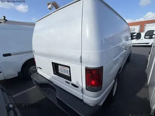 2010 Ford Econoline Cargo Commercial with VIN 1FTNE1EW9ADA90897, listed as a IAAI auction lot 42175233 with 222,826 mi miles. Bid and sale history available at carsss.com. Image 1.