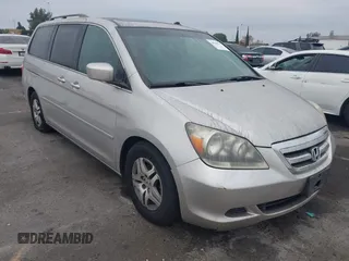 2007 Honda Odyssey EX-L with VIN 5FNRL38647B413026, listed as a IAAI auction lot 41824641 with 221,480 mi miles. Bid and sale history available at carsss.com. Image 1.