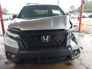 2021 Honda Passport Sport with VIN 5FNYF7H26MB014556, listed as a IAAI auction lot 41683680 with 97,829 mi miles and . Bid and sale history available at carsss.com. Image 12.