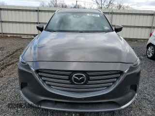2016 Mazda CX-9 Grand Touring z VIN JM3TCBDY2G0114342, wystawiony jako Copart lot #49883325 z przebiegiem 41 716 mil mil oraz Czysty tytuł • Clean title. Historia ofert i sprzedaży dostępna na DreamBid. Obrazek 5.