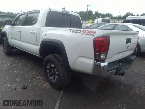 2017 Toyota Tacoma SR5 with VIN 3TMCZ5AN0HM099549, listed as a IAAI auction lot 33153884 with 58,517 mi miles and . Bid and sale history available at DreamBid. Image 4.