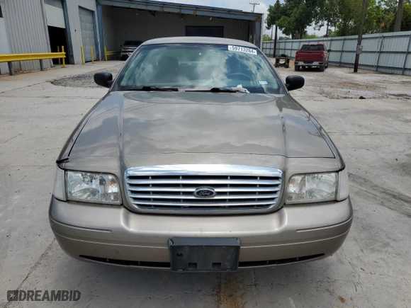 2005 Ford Crown Victoria Standard with VIN 2FAFP73WX5X144927, listed as a Copart auction lot 59713204 with 160,270 mi miles and Salvage Title. Bid and sale history available at carsss.com. Image 5.