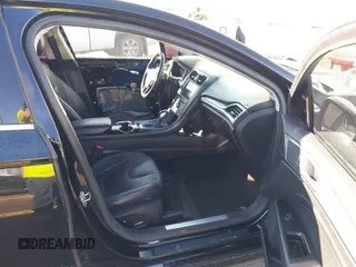2016 Ford Fusion Titanium with VIN 3FA6P0K9XGR152837, listed as a IAAI auction lot 41647436 with 196,700 mi miles. Bid and sale history available at carsss.com. Image 5.