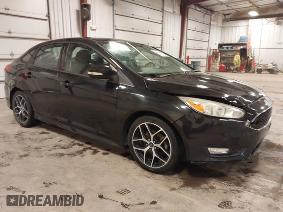 2015 Ford Focus SE with VIN 1FADP3F24FL255450, listed as a IAAI auction lot 41673301 with 103,650 mi miles. Bid and sale history available at carsss.com. Image 1.