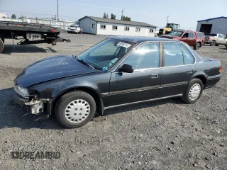 1993 Honda Accord LX with VIN 1HGCB755XPA191159, listed as a Copart auction lot 69899214 with 227,026 mi miles and Salvage Title. Bid and sale history available at carsss.com. Image 1.
