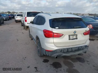 2016 BMW X1 xDrive28i with VIN WBXHT3C3XGP889461, listed as a IAAI auction lot 41757627 with 105,681 mi miles. Bid and sale history available at carsss.com. Image 3.