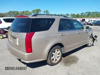 2006 Cadillac SRX z VIN 1GYEE637760197643, wystawiony jako IAAI lot #41864261 z przebiegiem 223 047 mil mil oraz . Historia ofert i sprzedaży dostępna na DreamBid. Obrazek 4.